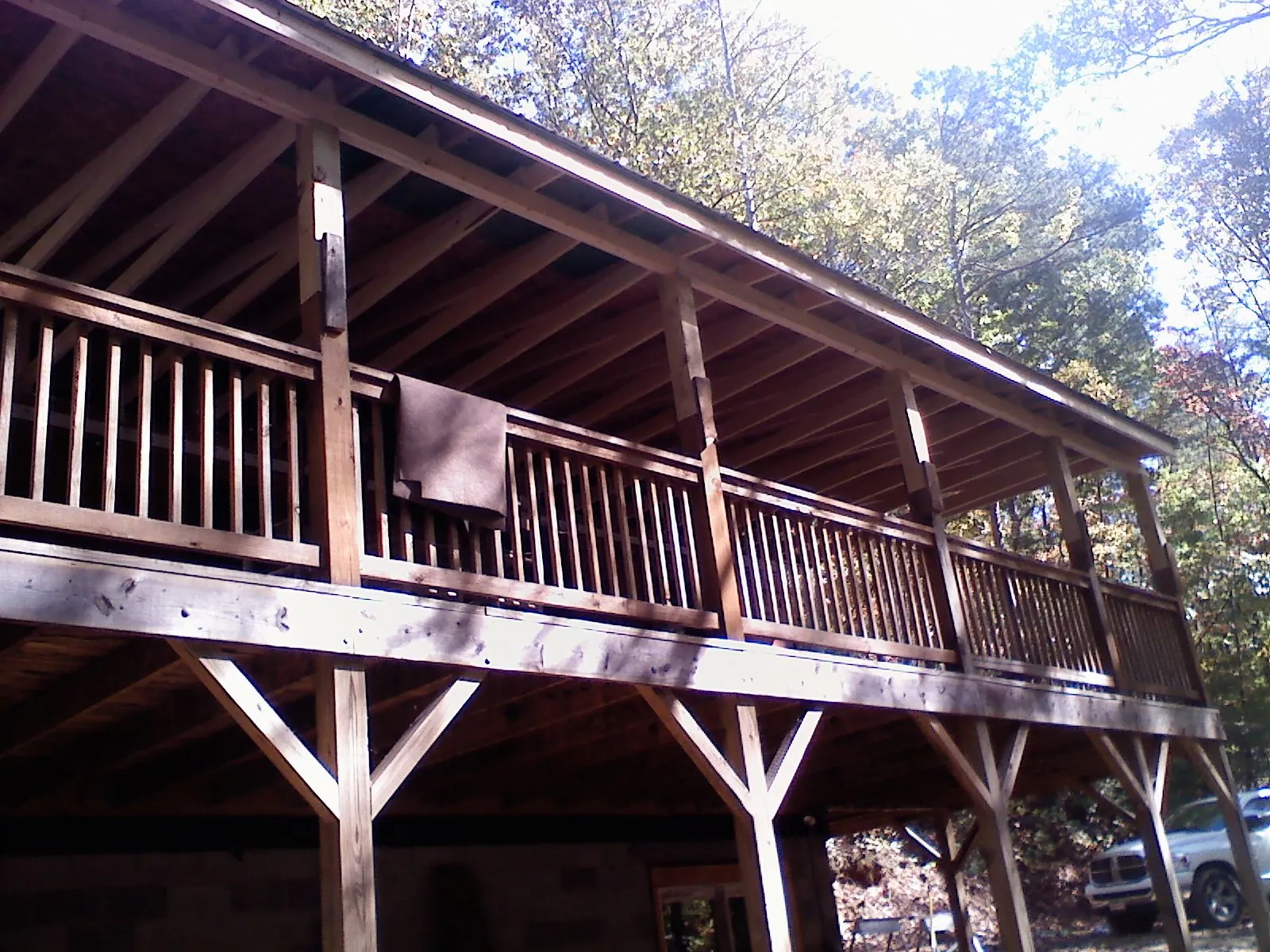 Timber framing under a new elevated porch and deck — Roof Leak Repair in Nederland by Roofing Brothers
